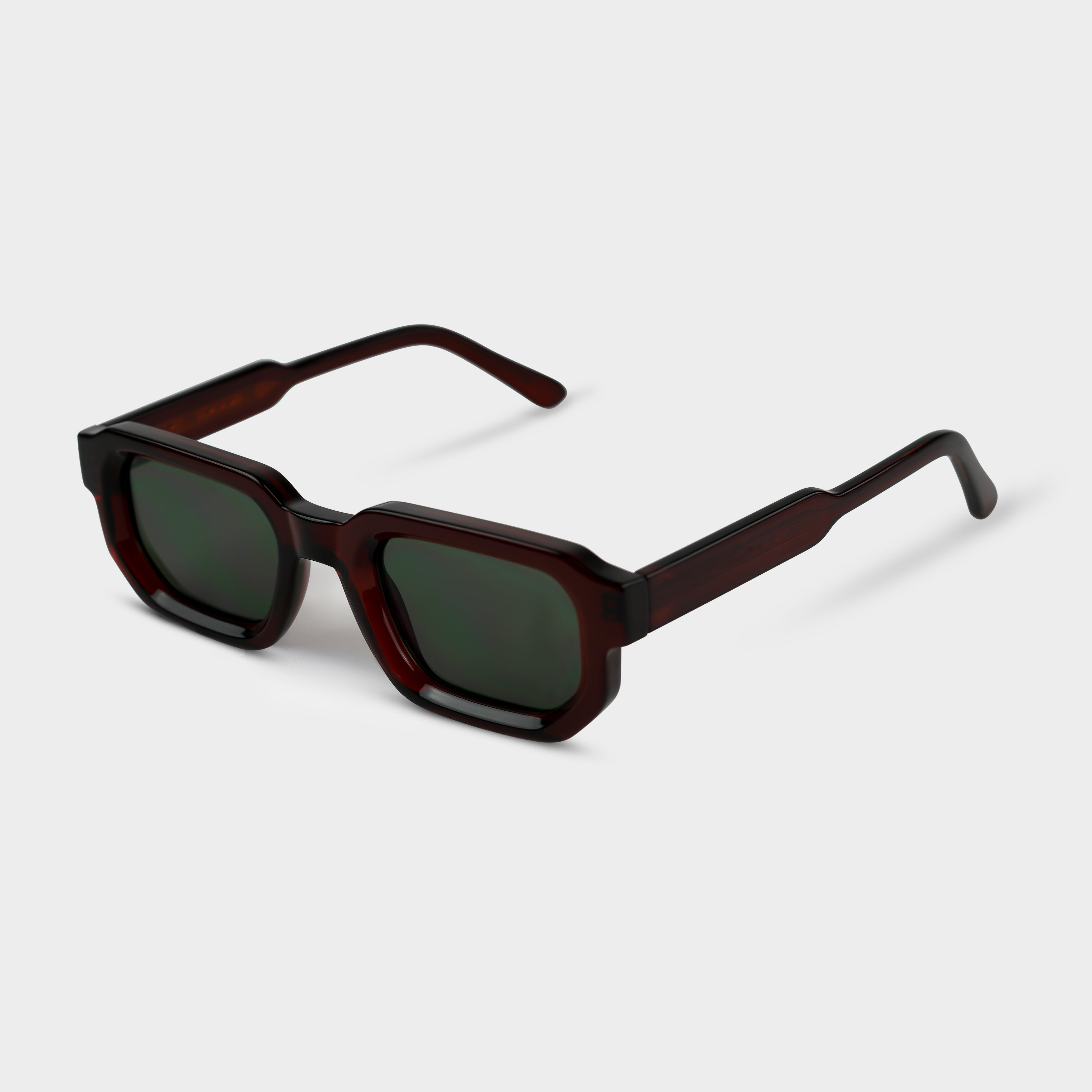Sunglasses William Buff in reddish brown with green lenses, oblique angle
