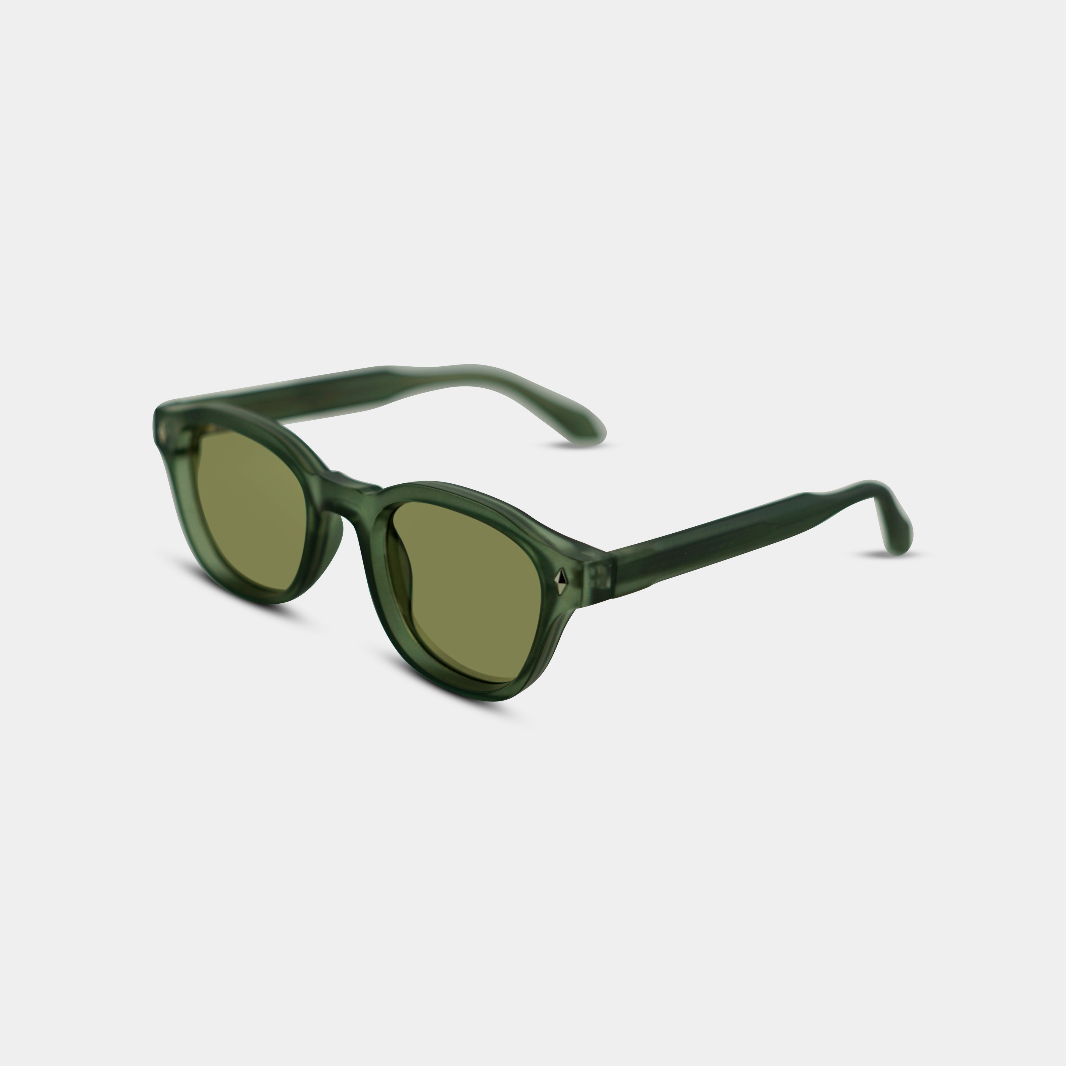 Hjalmer Khaki sunglasses in olive green seen from the side on a white background