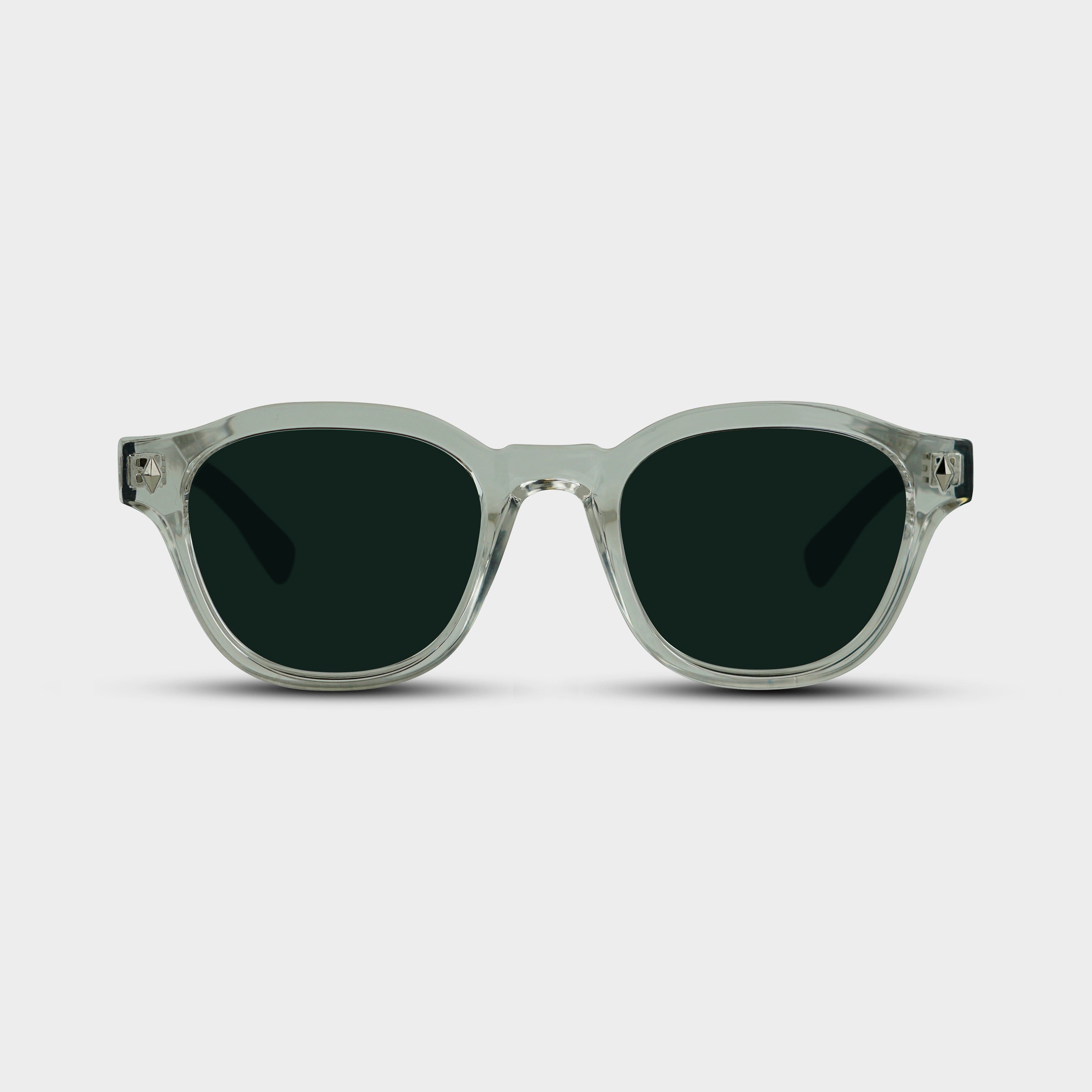 Hjalmer Lucid sunglasses with transparent frame and dark lenses seen from the front