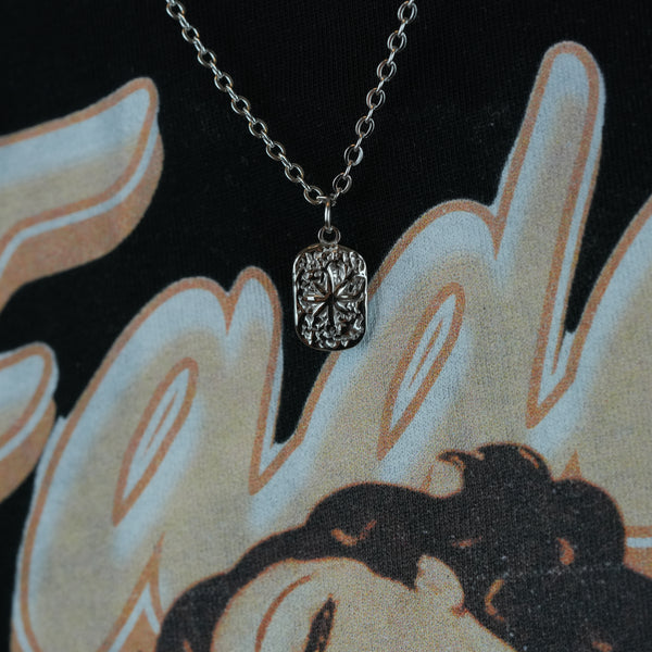 Hammered Sun Necklace – Hammered sun necklace in silver-colored steel